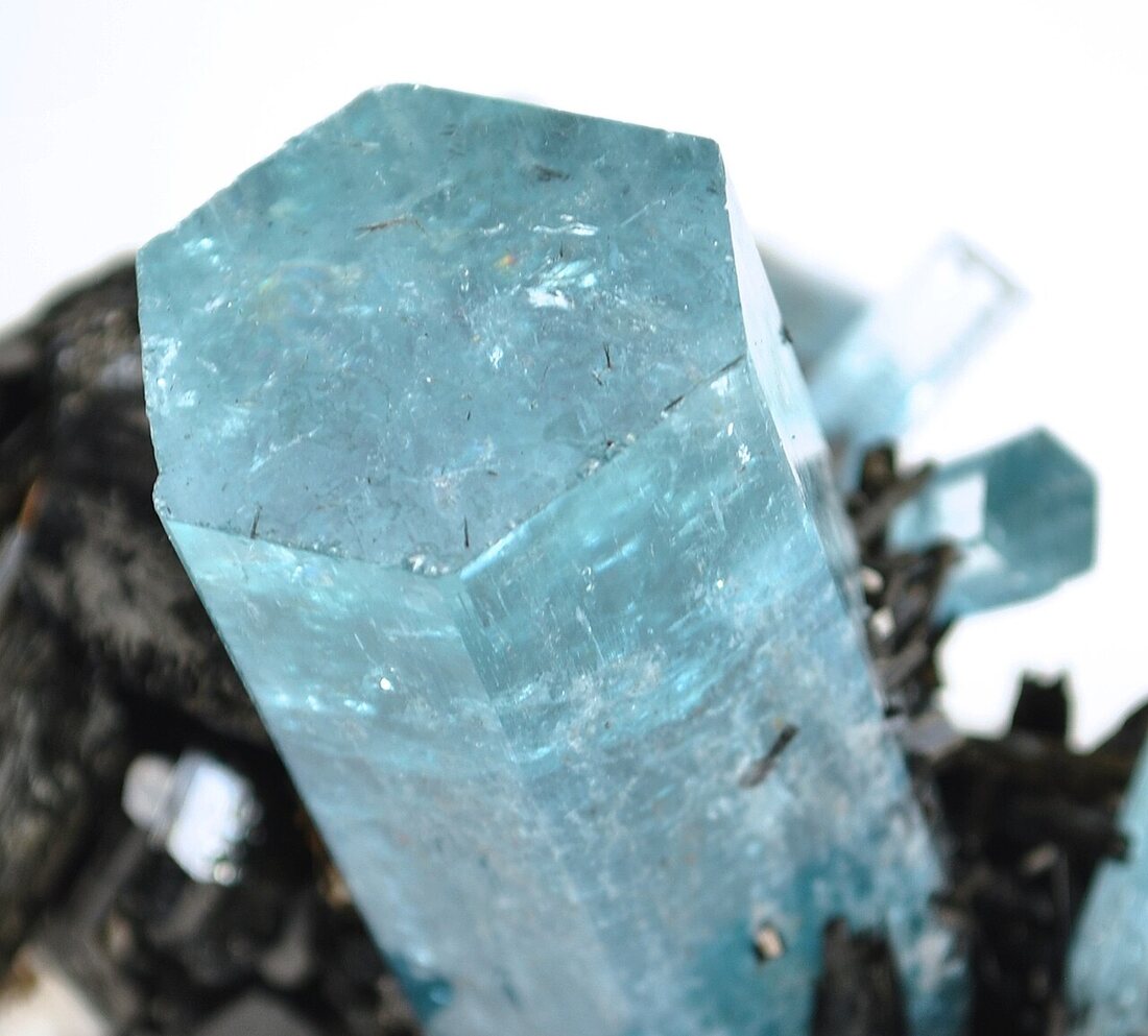 Aquamarine specimen — sky-blue beryl prism, gem-clear