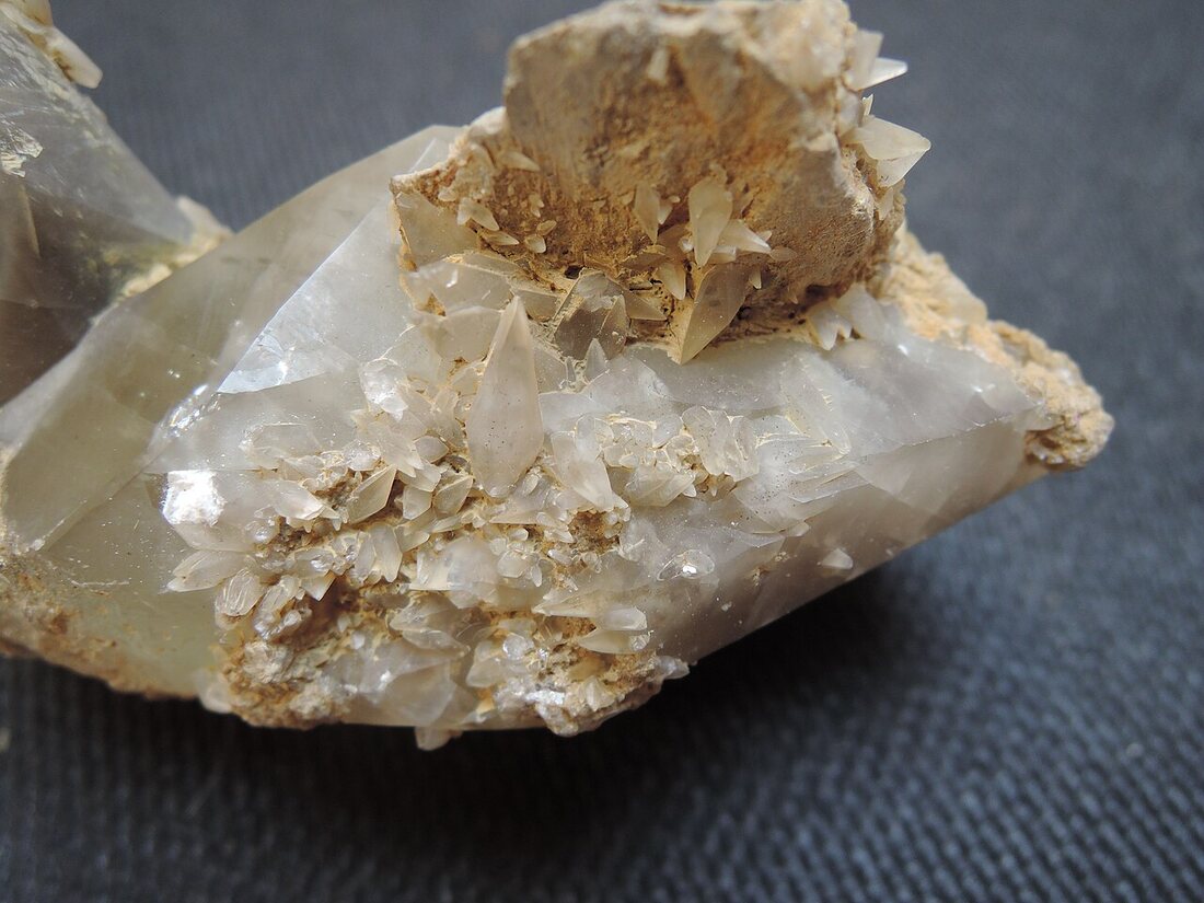 Calcite specimen — colourless rhombs on matrix