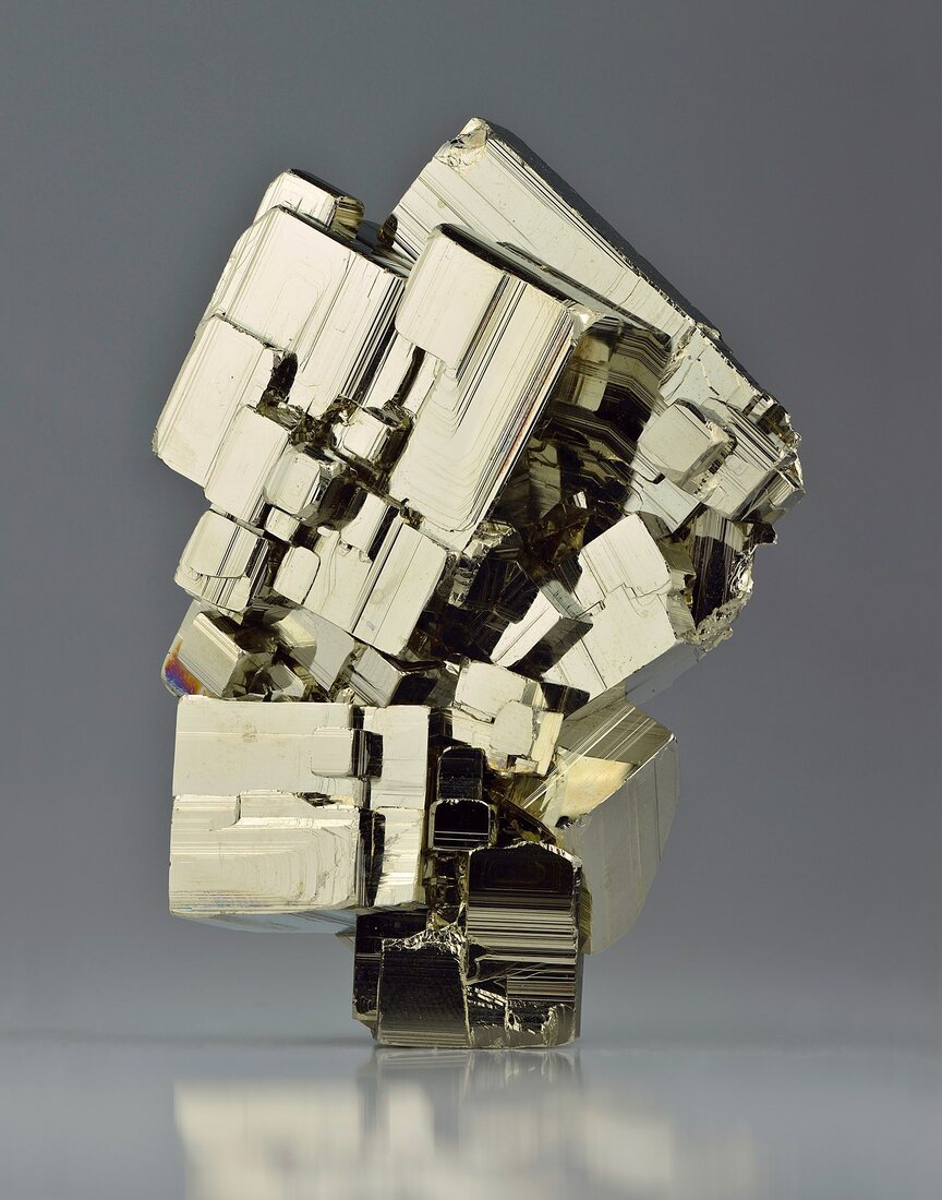 Pyrite specimen — brassy metallic cubes with striated faces